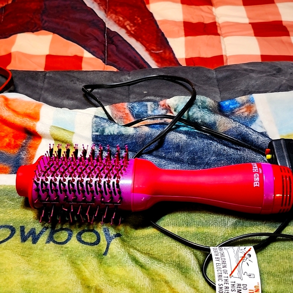 Bed head dryer and brush in one